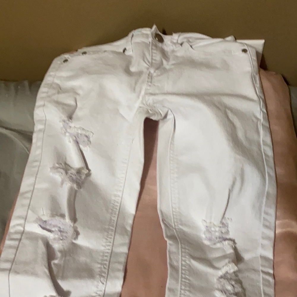 White ripped jeans